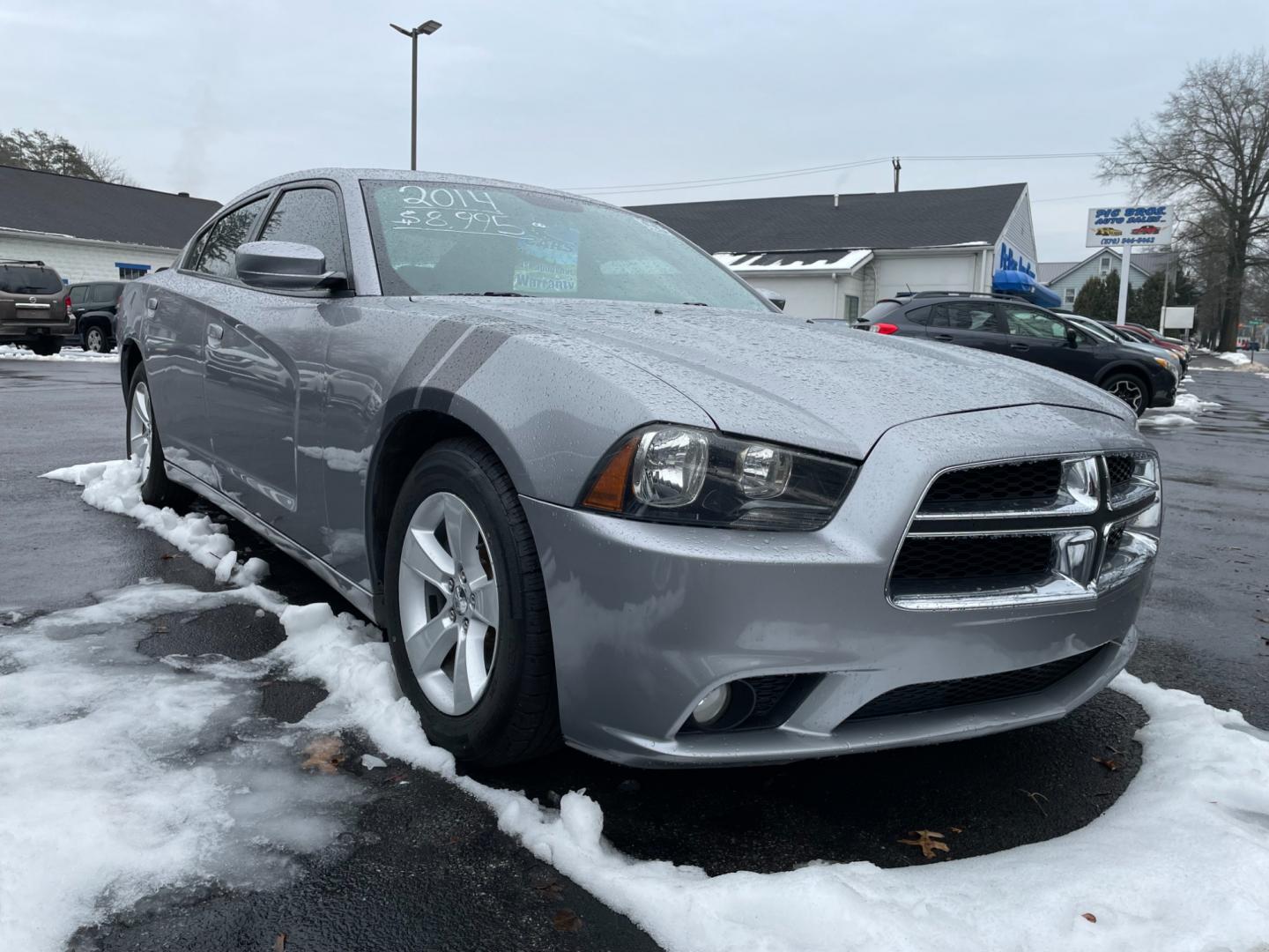 2014 silver Dodge Charger SXT (2C3CDXHG1EH) with an 3.6L V6 DOHC 24V engine, 8-Speed Automatic transmission, located at 101 N. Main Street, Muncy, PA, 17756, (570) 546-5462, 41.207691, -76.785942 - Photo#1